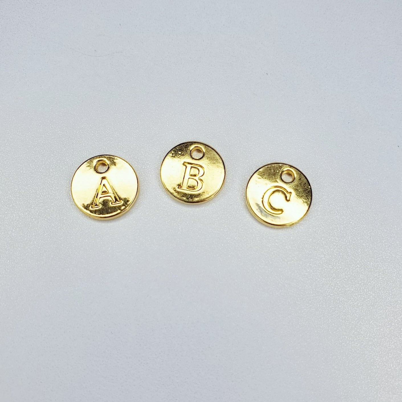 Round Disk Initial Charm