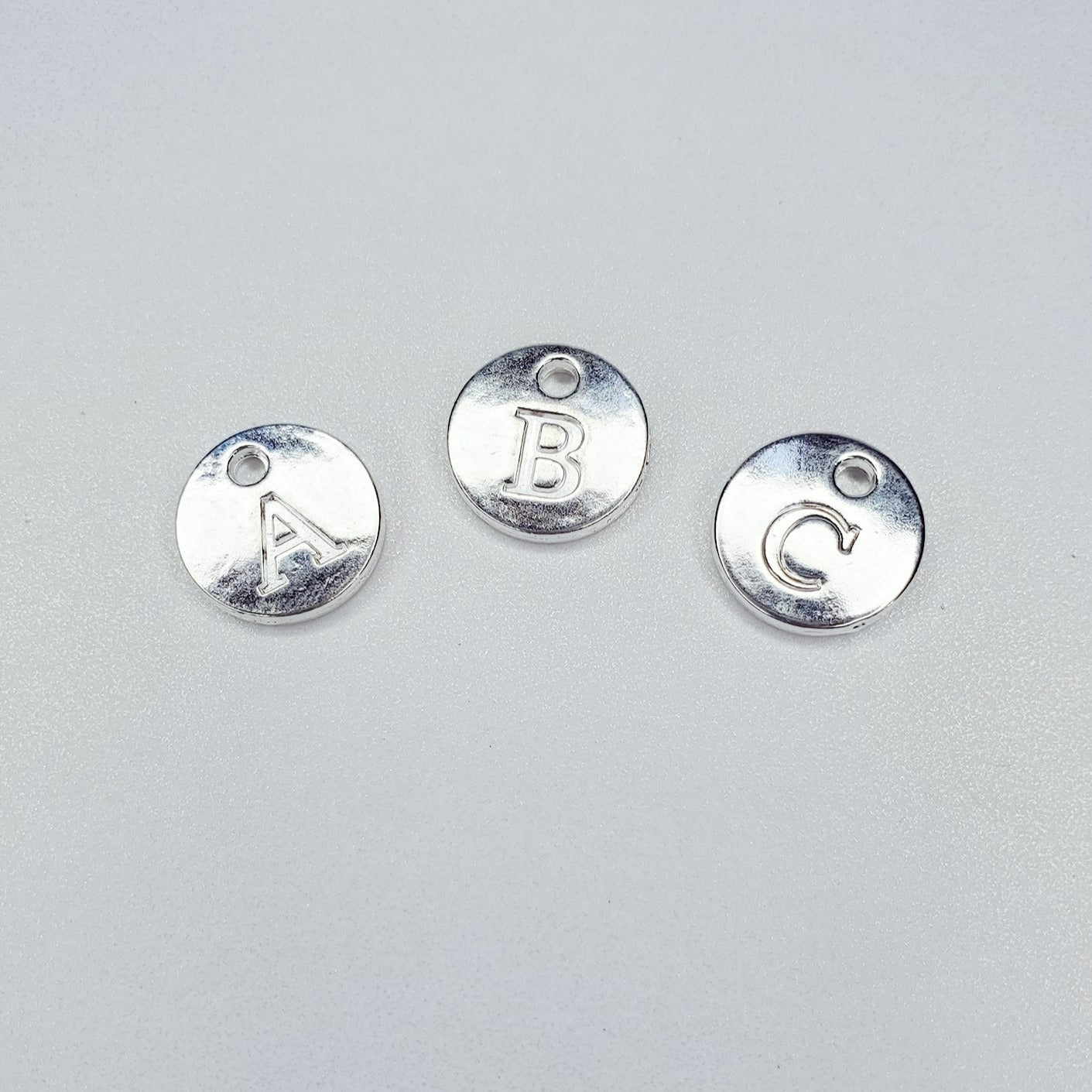 Round Disk Initial Charm