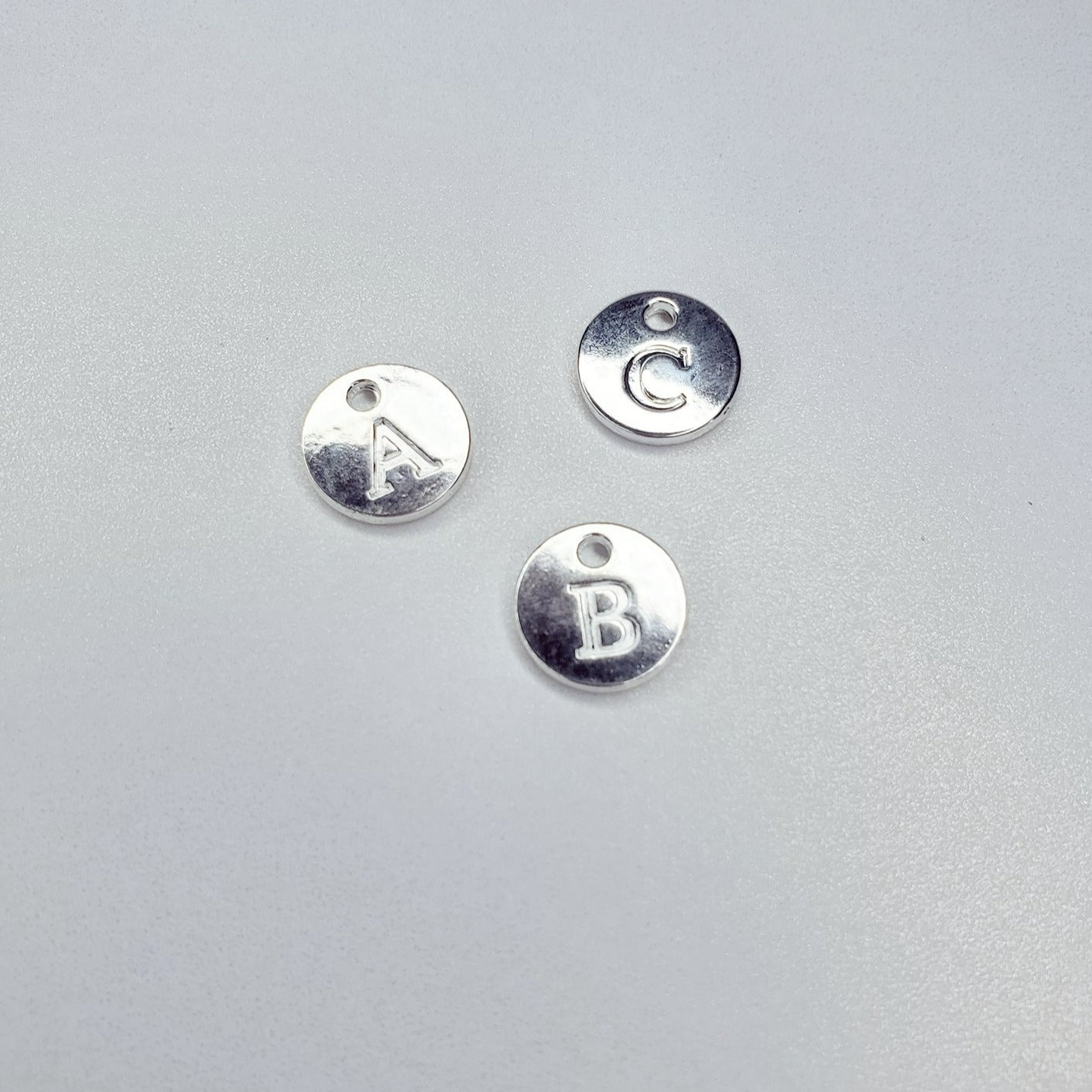 Round Disk Initial Charm