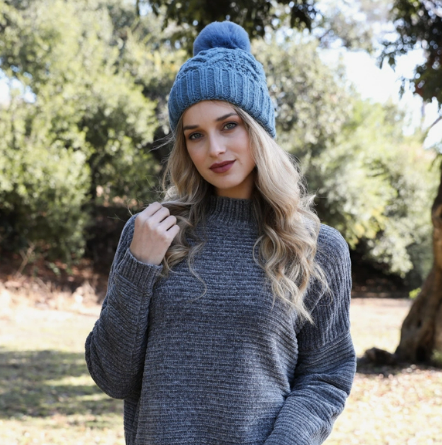Warm Feels Women's Fleece Thermal Lining Cable Knit Faux Fur Pom Beanie in Blue