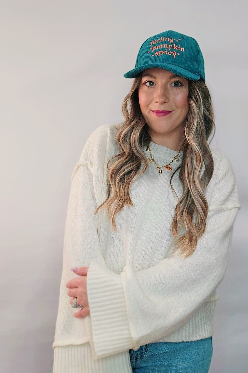 Teal corduroy and orange embroidered pumpkin spice baseball hat