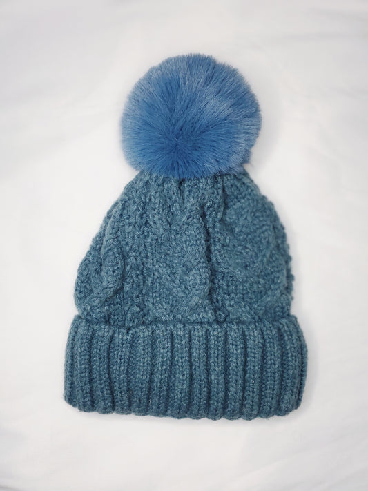 Warm Feels Women's Fleece Thermal Lining Cable Knit Faux Fur Pom Beanie in Blue